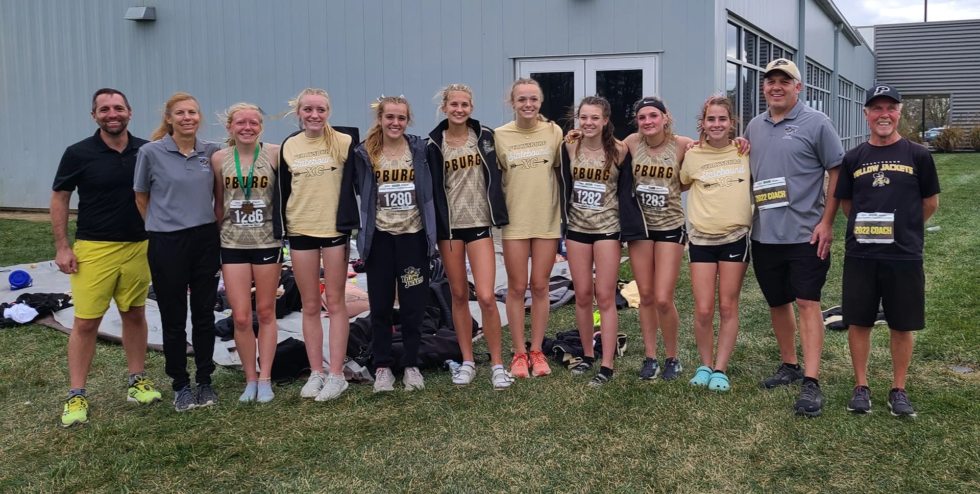 Athletics Team with Coaches Smiling